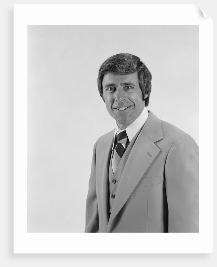 Smiling portrait business man three piece suit with vest by Anonymous