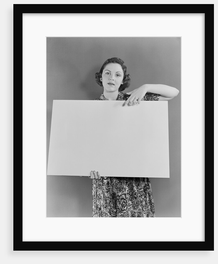 Woman holding blank poster sign hand pointing from top by Anonymous