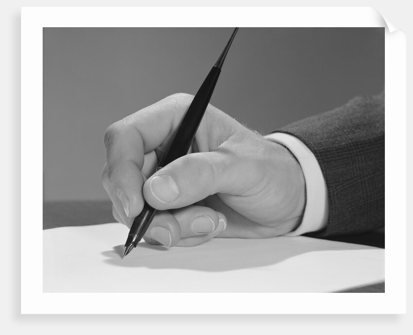 Male hand writing with fountain pen on blank paper by Anonymous