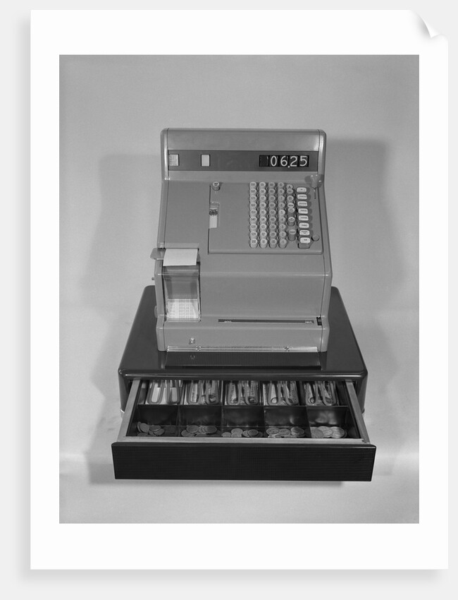 Cash register with money in the open till drawer by Anonymous