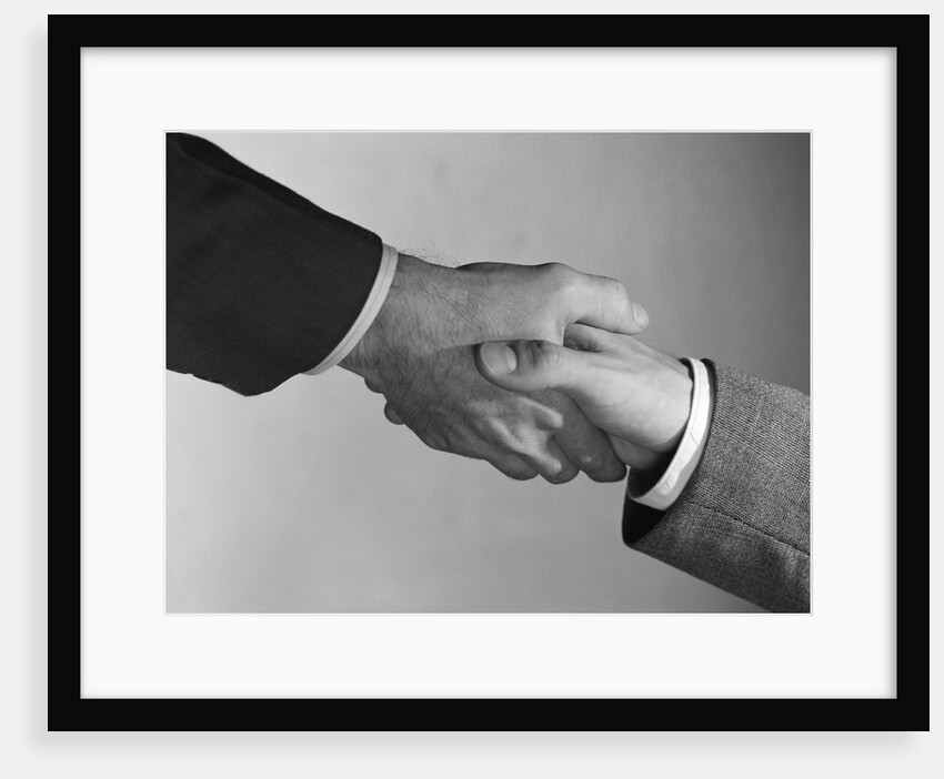Male handshake close-up of hands by Anonymous
