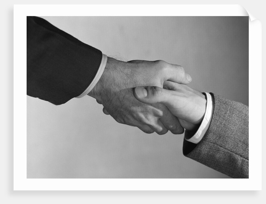 Male handshake close-up of hands by Anonymous