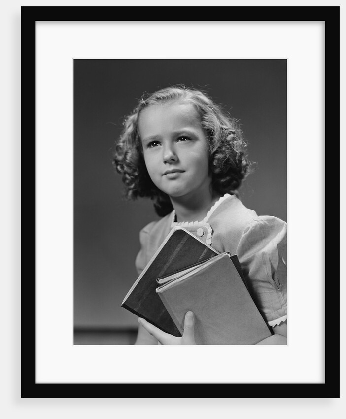 Portrait serious girl student holding school books by Anonymous