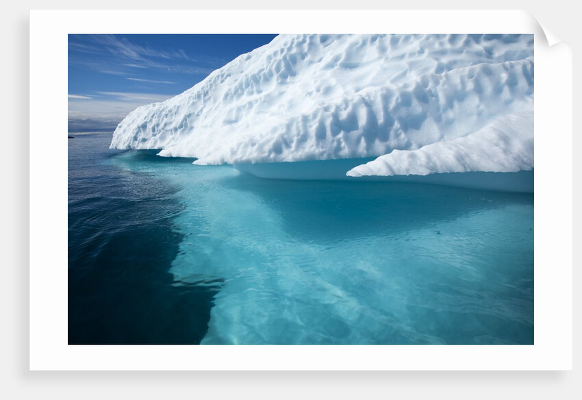 Iceberg above and below water in Disko Bay in Greenland by Anonymous