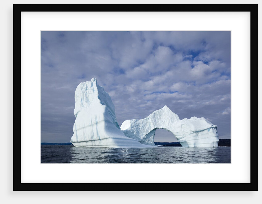 Arched iceberg in Disko Bay in Greenland by Anonymous