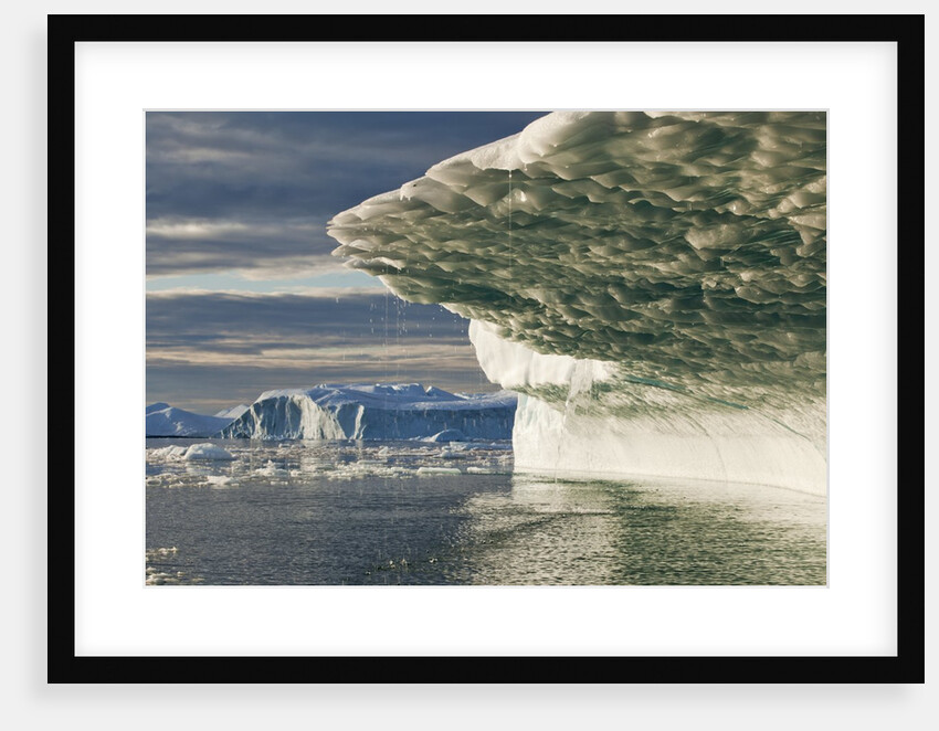 Iceberg melting in Disko Bay in Greenland by Anonymous