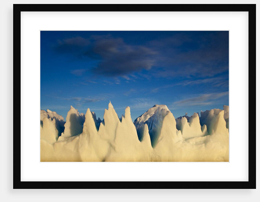 Jagged icebergs in Disko Bay in Greenland by Anonymous