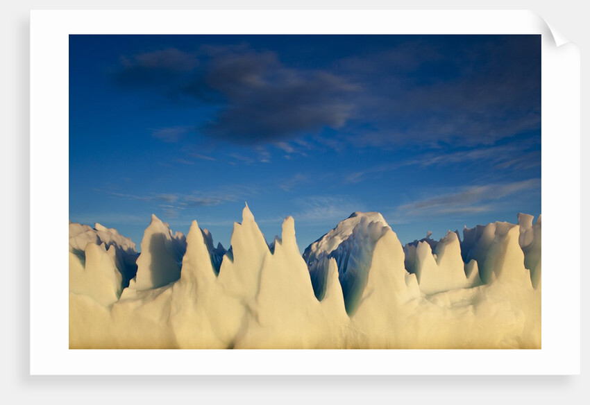 Jagged icebergs in Disko Bay in Greenland by Anonymous