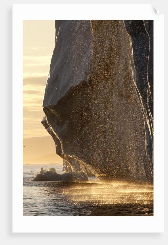 Iceberg melting in Disko Bay in Greenland by Anonymous