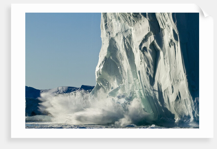 Calving iceberg in Disko Bay in Greenland by Anonymous