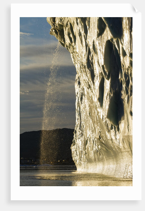 Melting iceberg in Disko Bay in Greenland by Anonymous