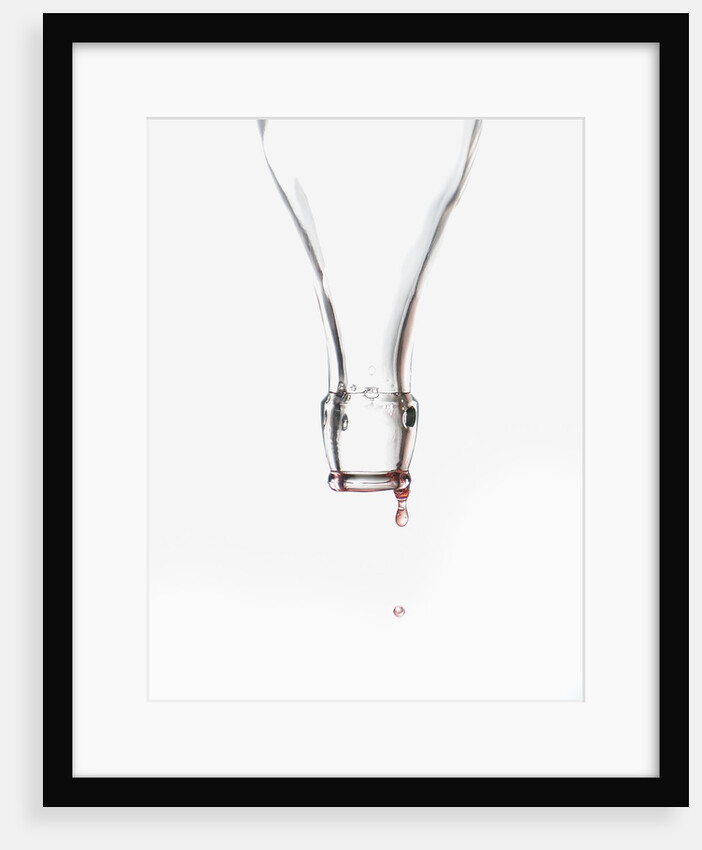 Liquid pouring out of empty bottle by Anonymous