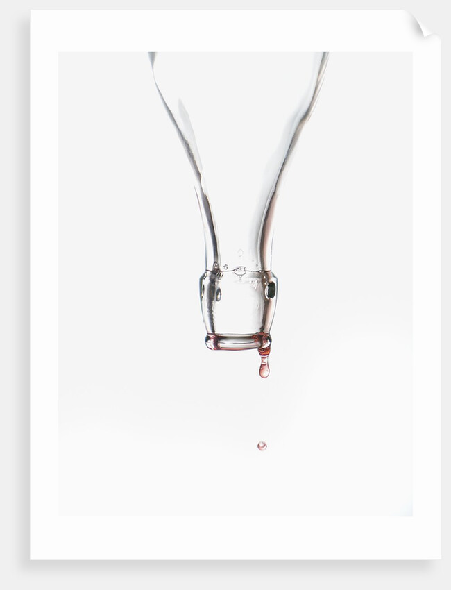 Liquid pouring out of empty bottle by Anonymous
