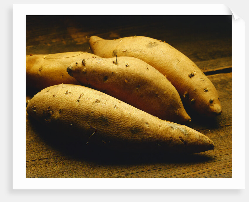 Yams on Wooden Table by Anonymous