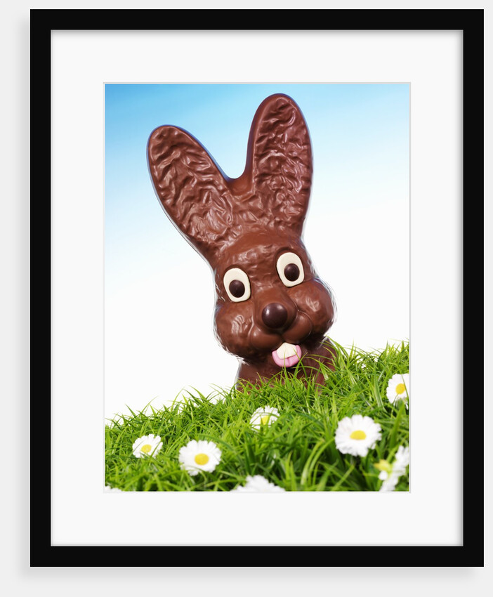 Chocolate Easter Bunny in Easter grass by Anonymous