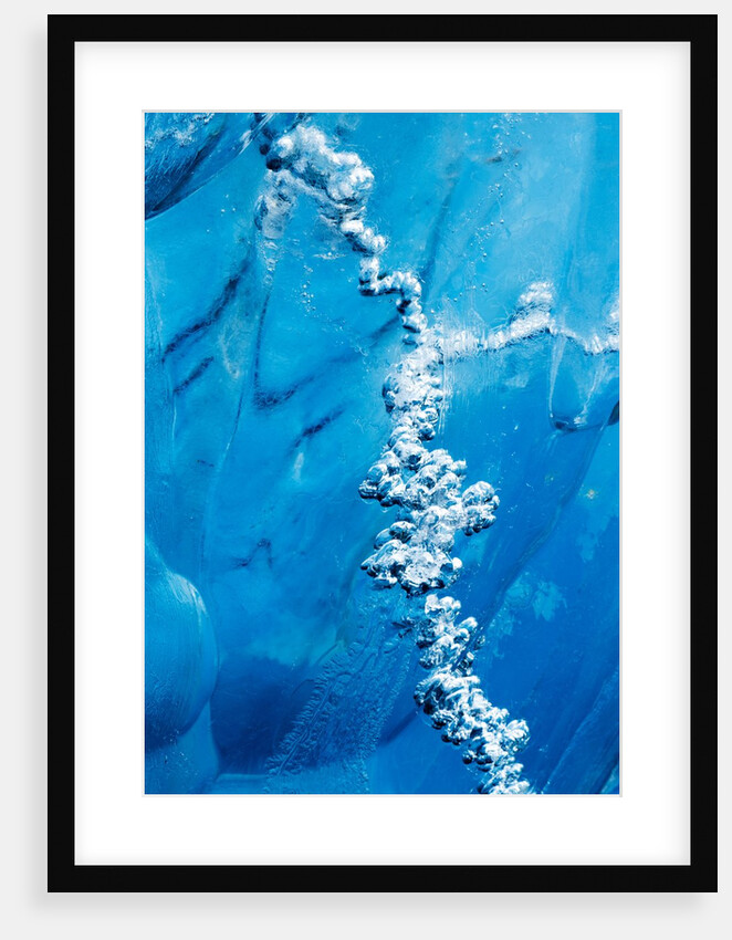 Air bubbles in melting iceberg by Anonymous