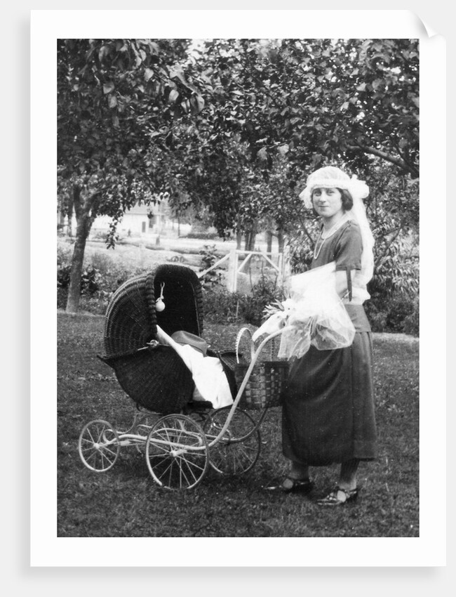Mother to be with stroller at baby shower, ca. 1924 by Anonymous