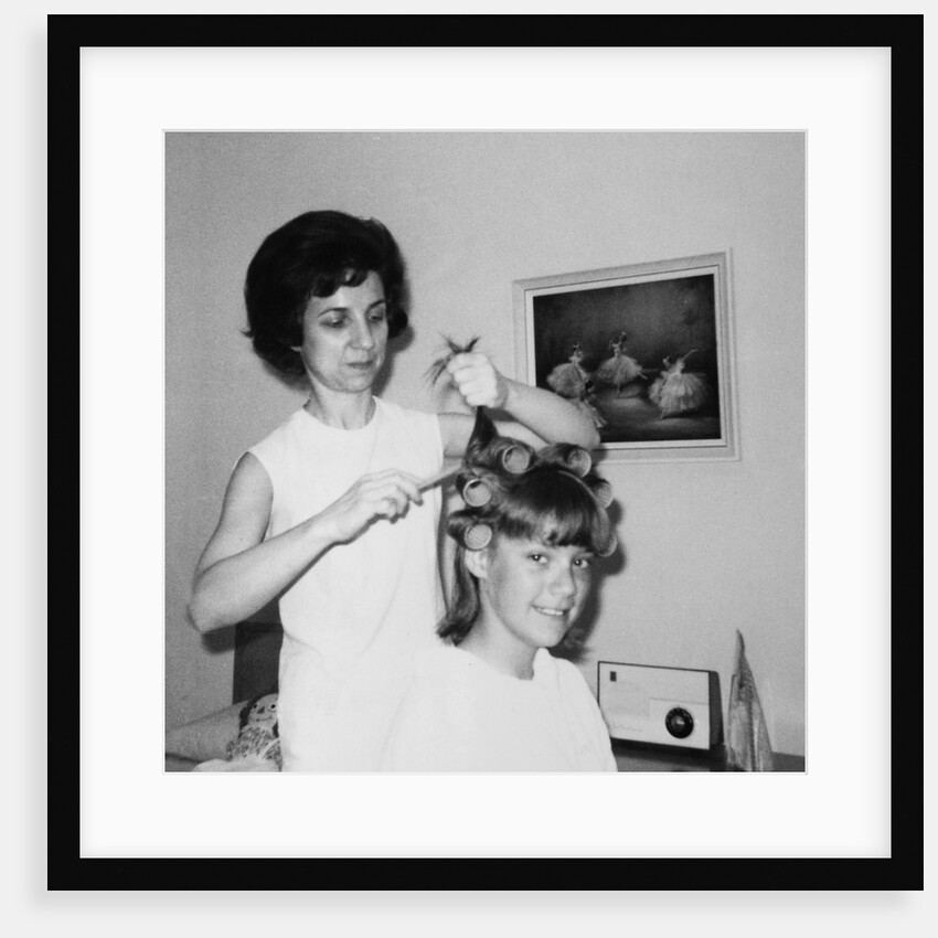 Mother helps 16 year old daughter get ready for date, ca. 1970 by Anonymous