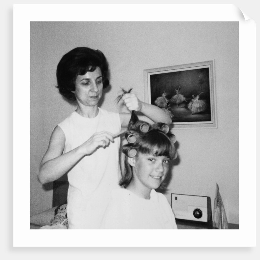 Mother helps 16 year old daughter get ready for date, ca. 1970 by Anonymous