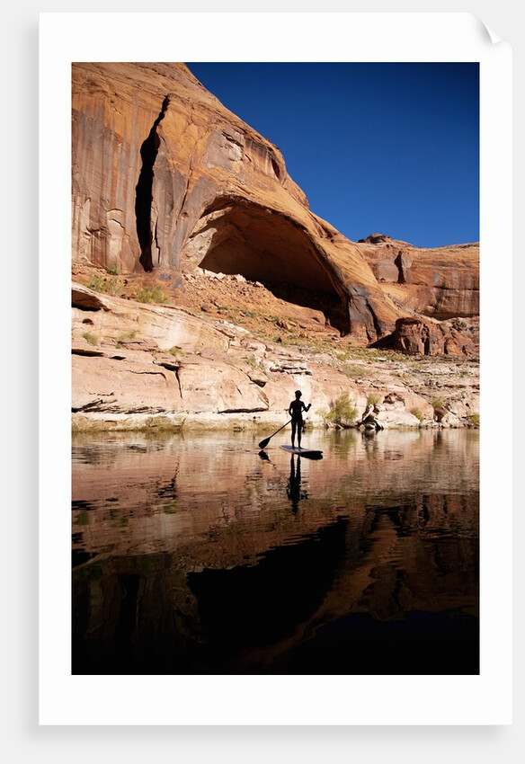 Stand-up paddleboarding on Lake Powell, Utah by Anonymous