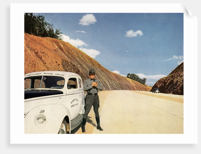 Policeman writing speeding ticket by Anonymous