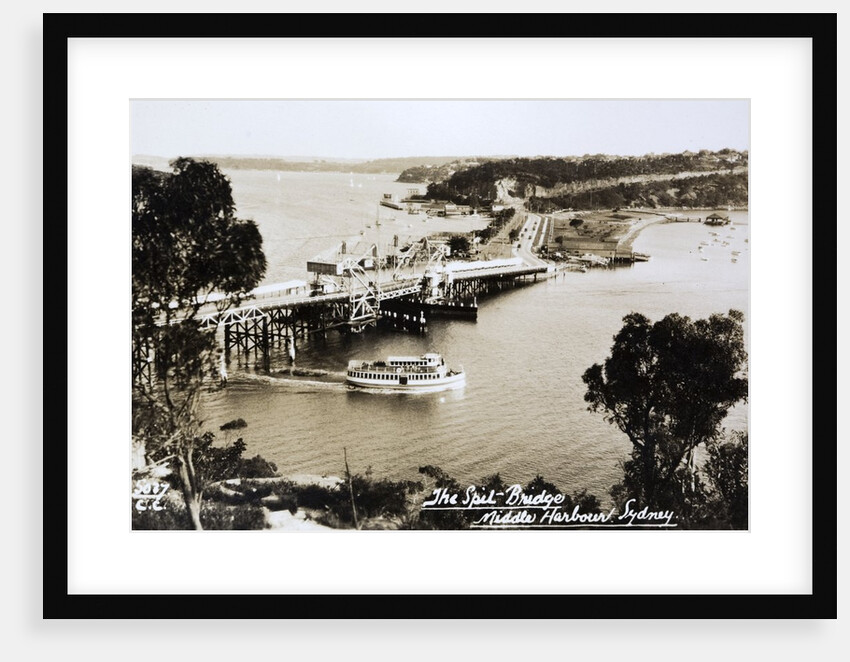 Sydney Spit Bridge, Middle Harbour, Sydney, New South Wales, Australia in 1924. The bridge shown is a wooden lifting bridge. On the road, there are cars of the period. by Anonymous