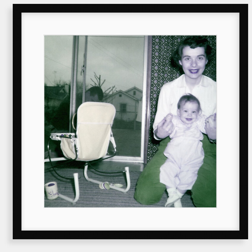 Proud new mother with baby, ca. 1956. by Anonymous