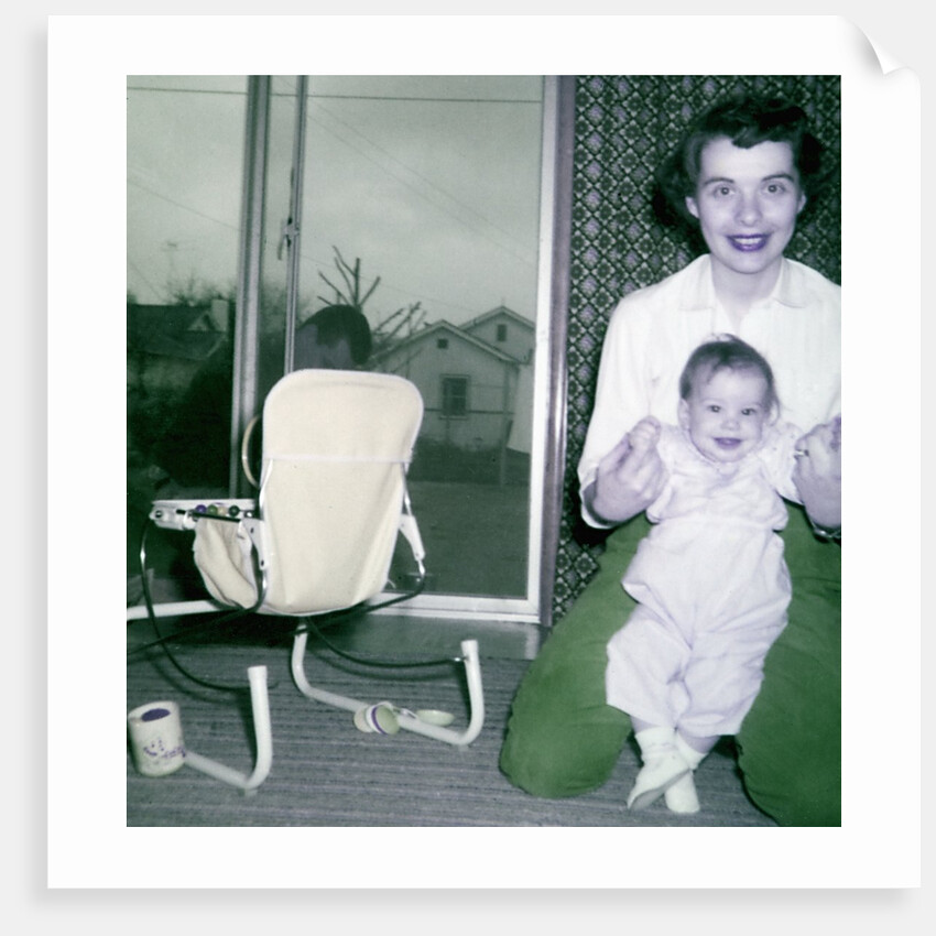 Proud new mother with baby, ca. 1956. by Anonymous