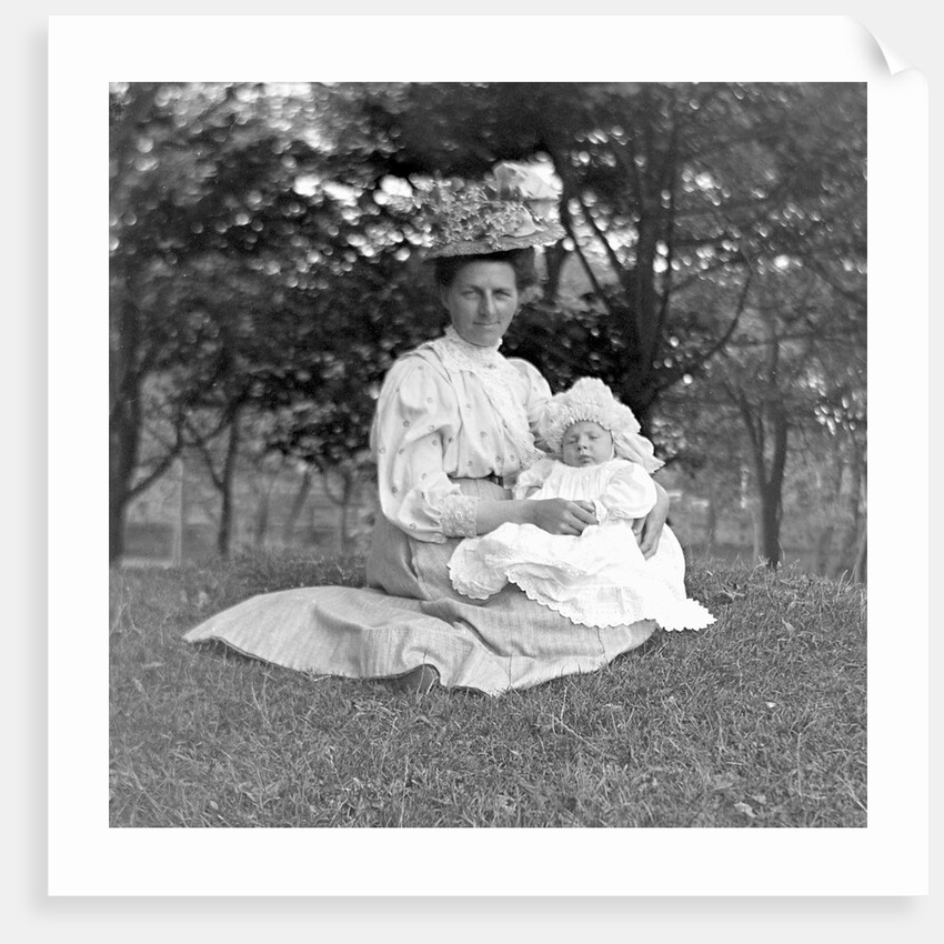 OIder woman and baby in a English park, ca. 1900. by Anonymous