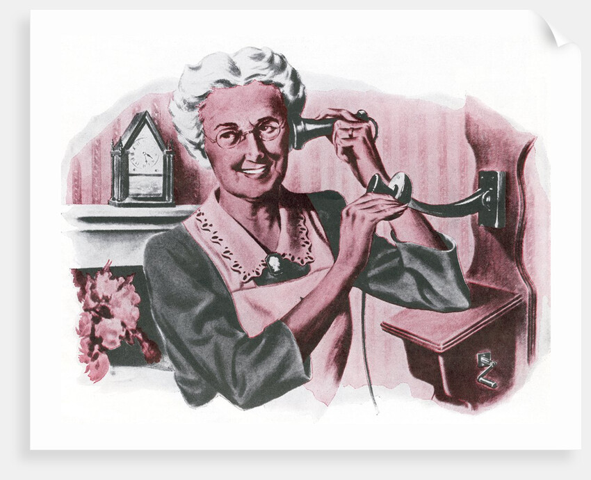 Grandmother on a crank wall telephone by Anonymous