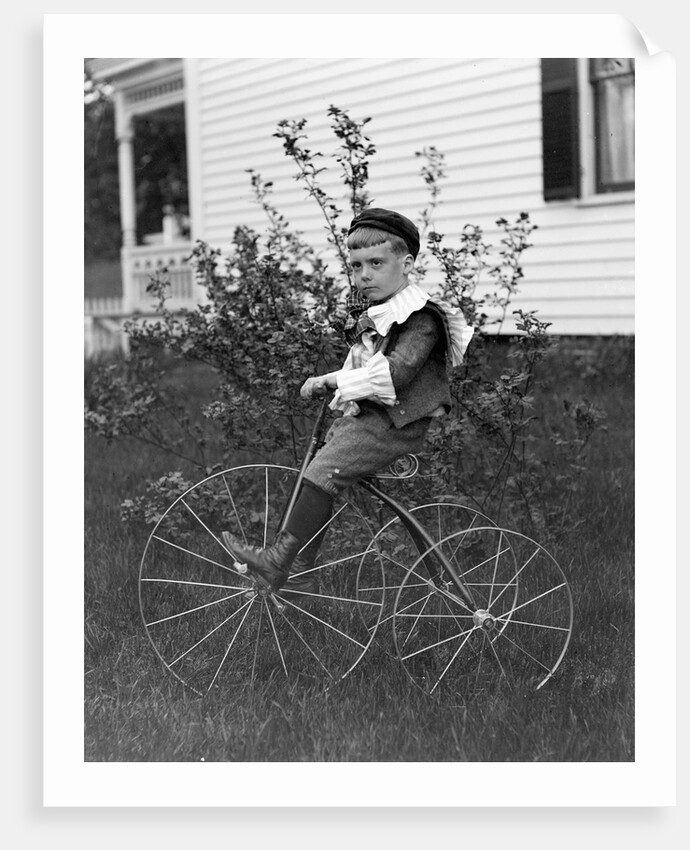 Toddler on a period tricycle, ca. 1895. by Anonymous