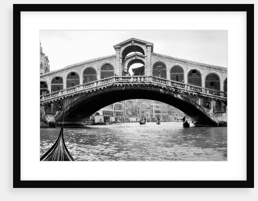 Gondola view of the Rialto Bridge in Venice, Italy, ca. 1912. by Anonymous