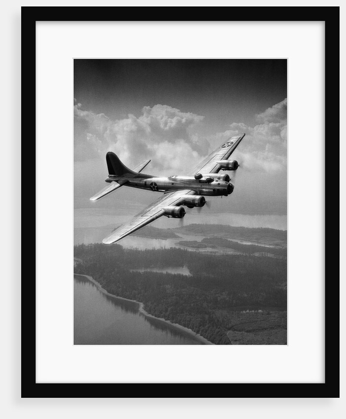 1940s us army aircraft world war ii b-17 bomber in flight by Anonymous