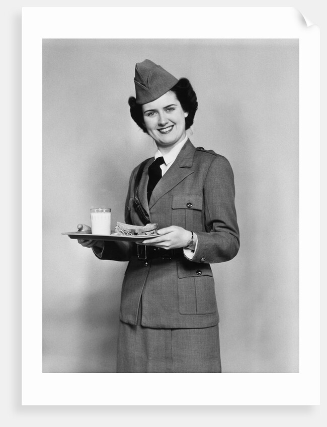 1940s army woman with lunch tray with a glass of milk and sandwich by Anonymous