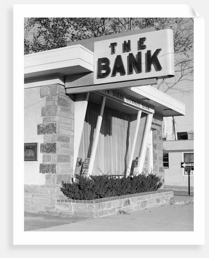 1960s window storefront of bank building by Anonymous