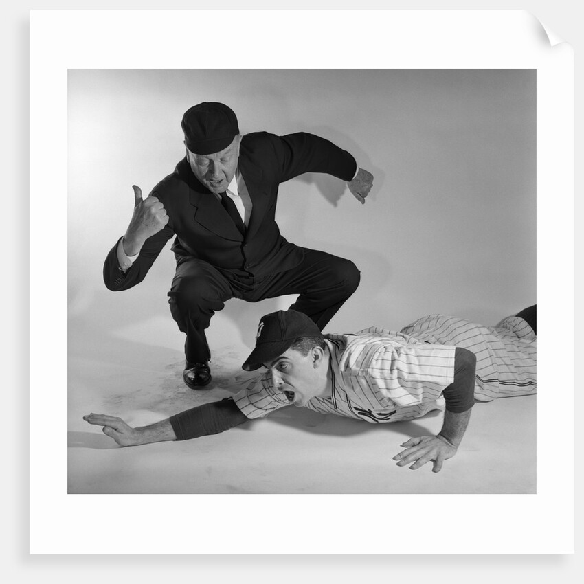 1950s baseball umpire calling sliding player out studio shot by Anonymous