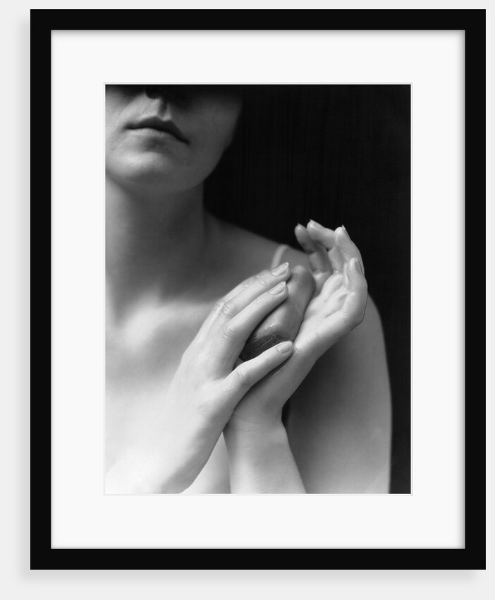 1930s female holding bar soap washing hands by Anonymous