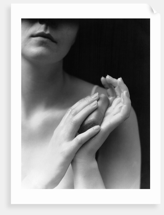 1930s female holding bar soap washing hands by Anonymous