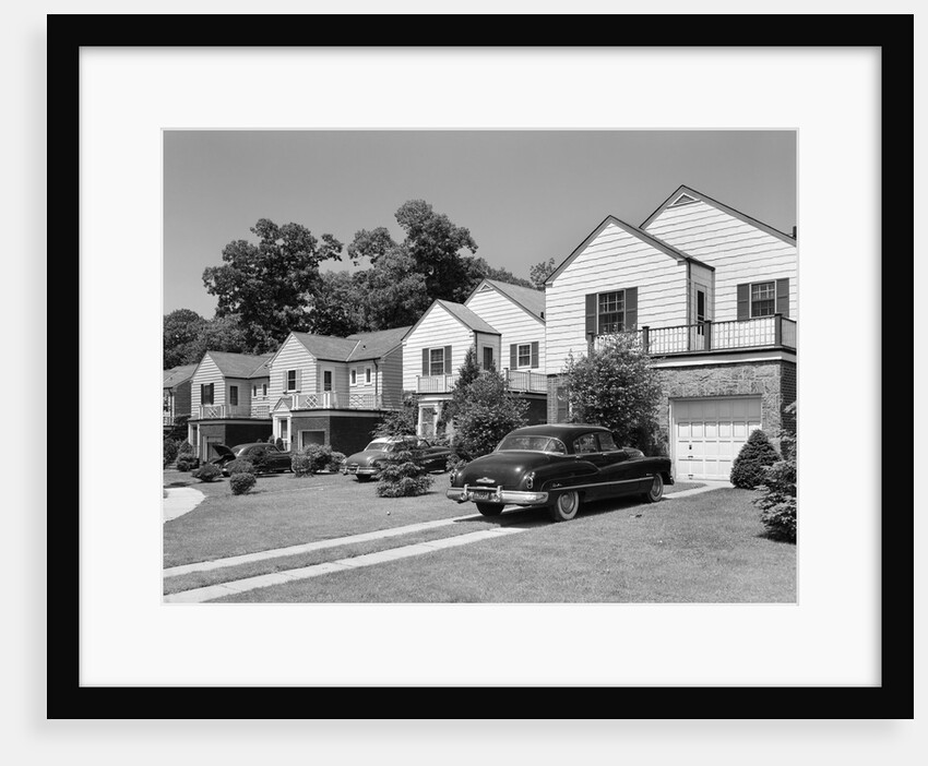 1950s suburban street of typical homes queens new york by Anonymous