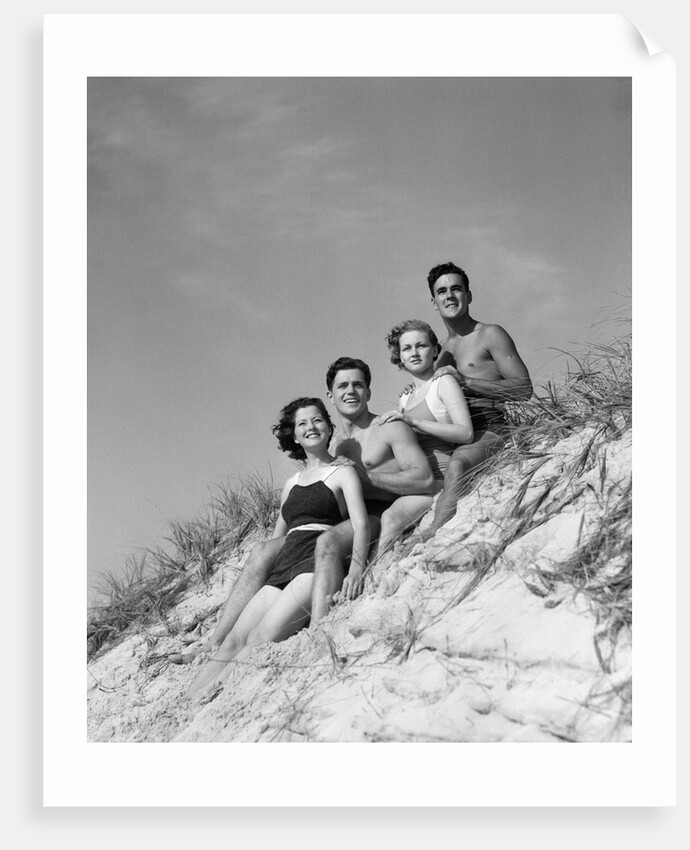 1930s group young men women posed on beach sand dune by Anonymous