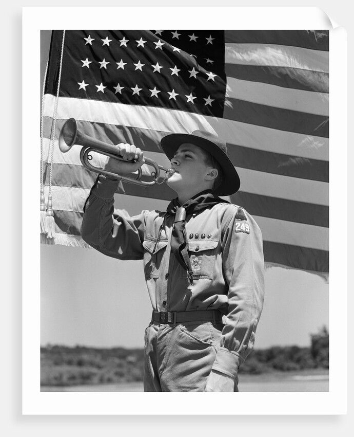 1940s boy scout playing bugle in front of 48 star american flag by Anonymous