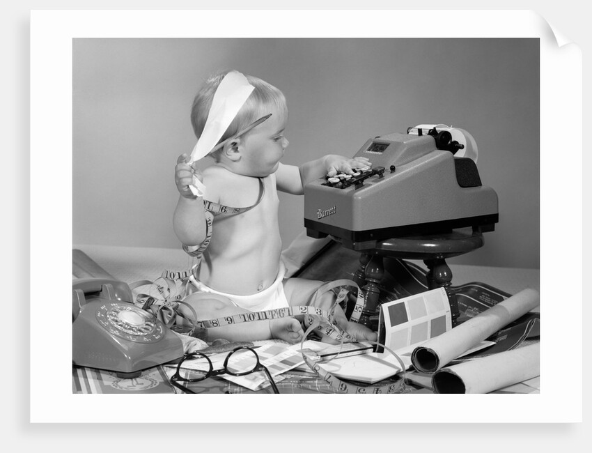 1960s baby with adding machine telephone blueprints paint samples and tape measure by Anonymous