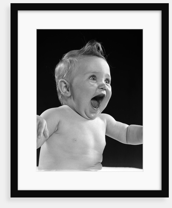 1950s happy baby head laughing with mouth wide open by Anonymous
