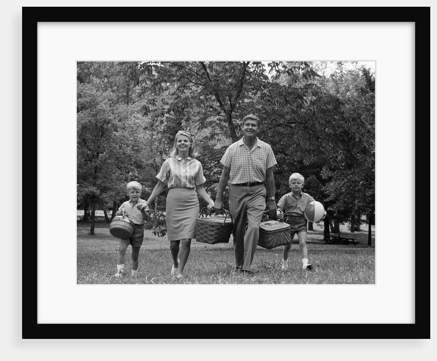 1960s family picnic walking toward looking at camera by Anonymous