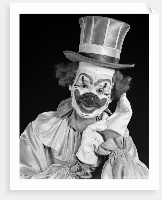 1950s portrait of clown wearing top hat smiling looking at camera by Anonymous