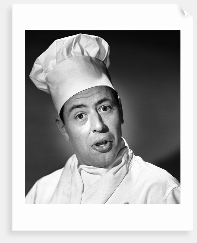 1950s portrait man chef humorous expression looking at camera by Anonymous