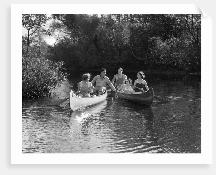 1930s summertime group of five young men & women in two canoes paddling down a stream by Anonymous