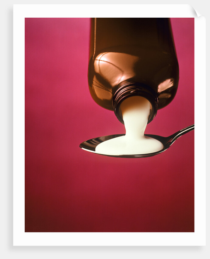 1980s spoonful of white medicine from bottle by Anonymous