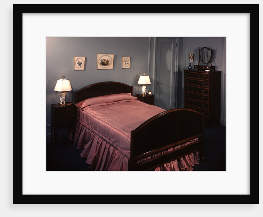 1930s 1940s bedroom double bed with pink satin bedspread by Anonymous