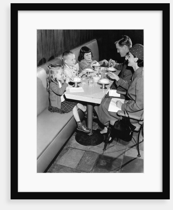 1950s family eating ice cream at a diner by Anonymous